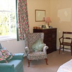Picture showing the seating area of one of the bedrooms at The Old Vicarage Bed and Breakfast accommodation in Great Thurlow near Newmarket.
